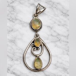 Sterling Silver Teardrop Pendant with Yellow-Green Opal Accent
